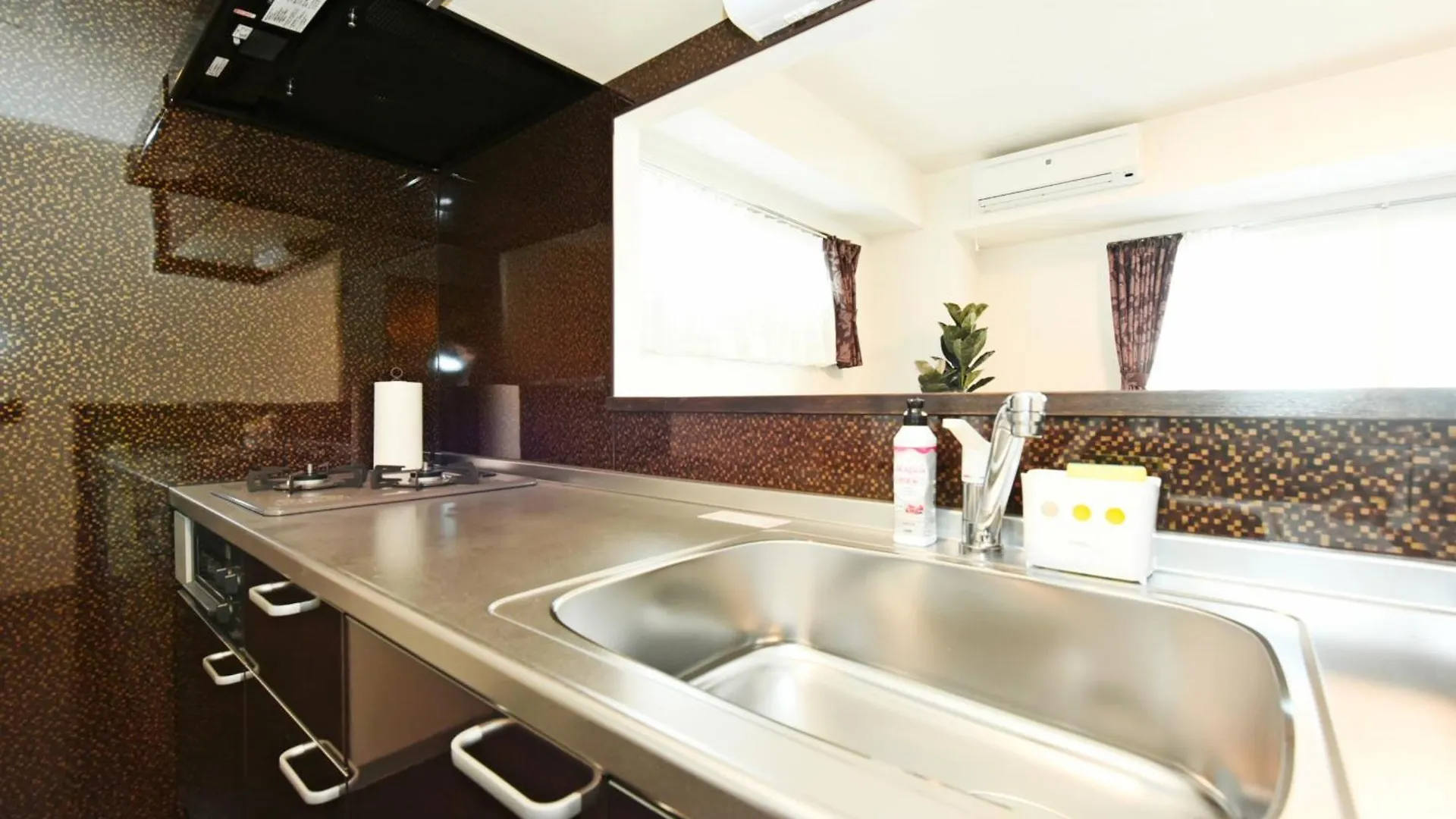 Апарт-отель Апарт отель Sun Court Hondori Garden Hills Tsukisappu