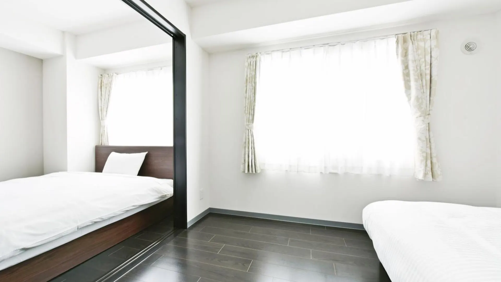 Апарт отель Sun Court Hondori Garden Hills Tsukisappu Апарт-отель